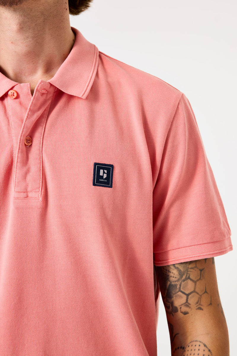Polo rose saumon