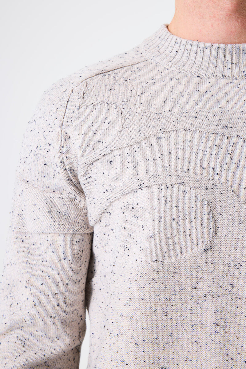 Pull beige moucheté