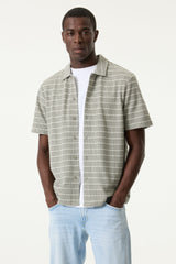 Polo vert à motifs